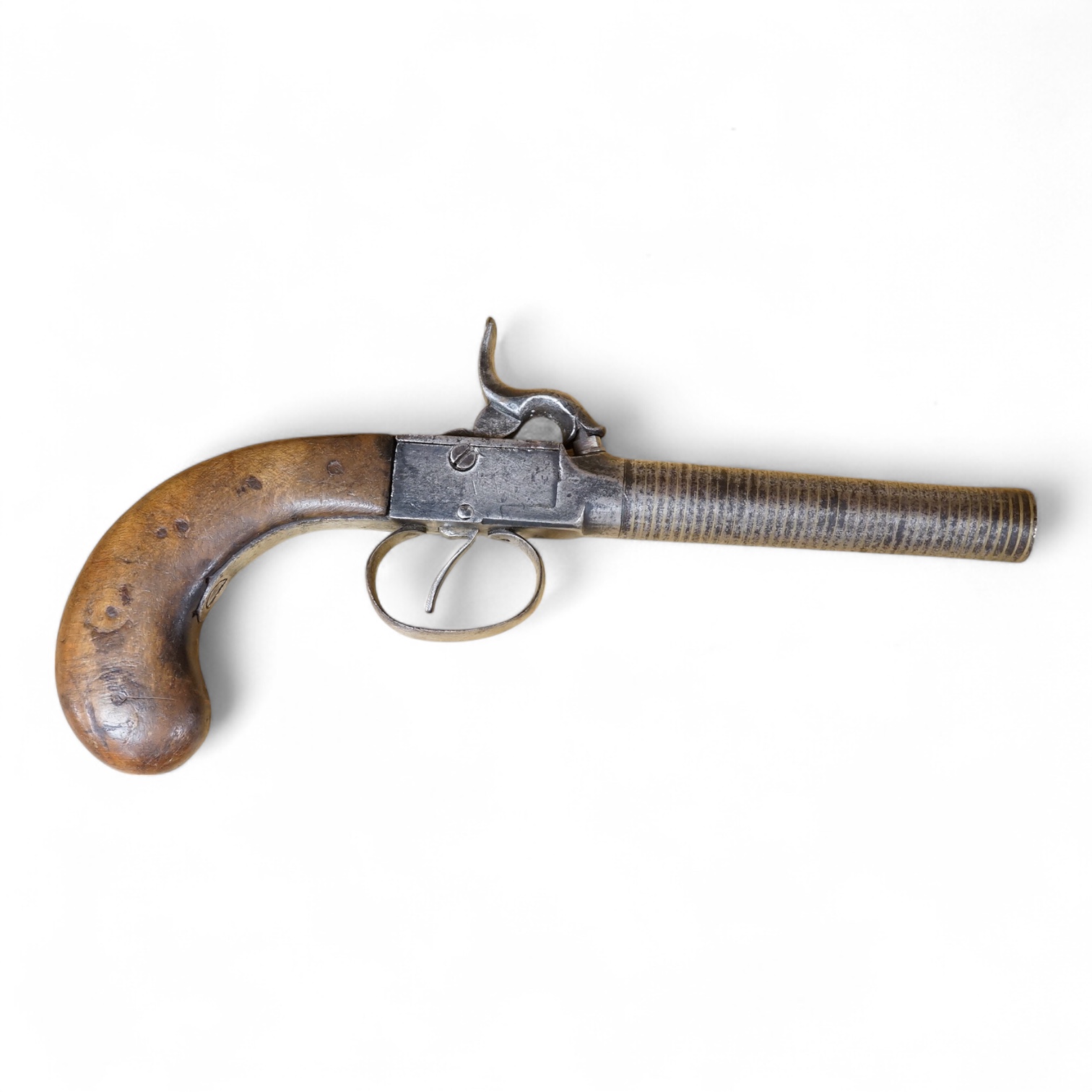 A boxlock percussion pocket pistol with turn off barrel inlaid with spiral brass wire for full length, plain frame and rounded walnut grip, probably Belgium made